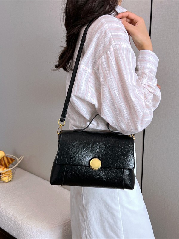 Bolso de mano de alta sensación para mujeres 2026 verano nuevo nicho de lujo ligero bolso cuadrado retrógrado ocio mochila de hombro