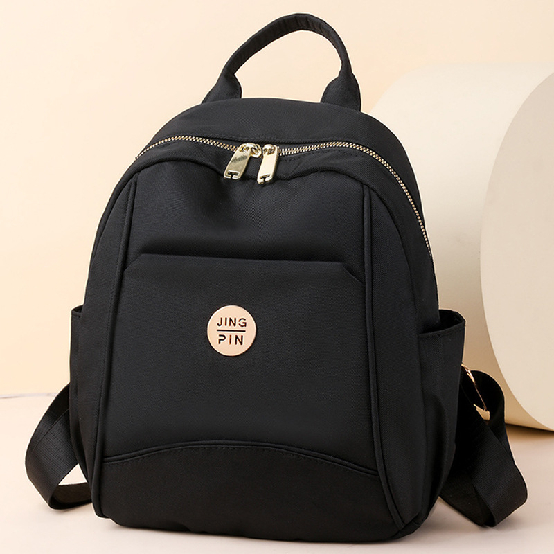 2024 verano nueva mochila de nailon para mujer simple y versátil mochila de viaje ligera al aire libre mochila escolar para estudiantes