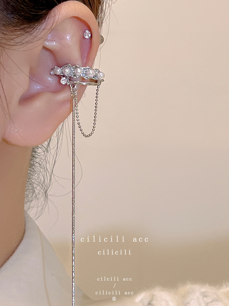 Diseño de nicho de alta gama borla larga sin orejas clip de oreja elegante estilo occidental de las mujeres cara-mirando pequeños nuevos pendientes de moda