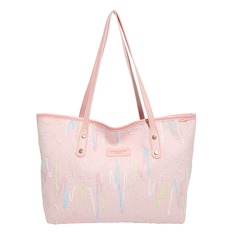 Bolsas de tela de clase de estudiantes para mujeres 2025 nuevo hombro brazalete estriado de gran capacidad de viaje ocio bolsa de mano