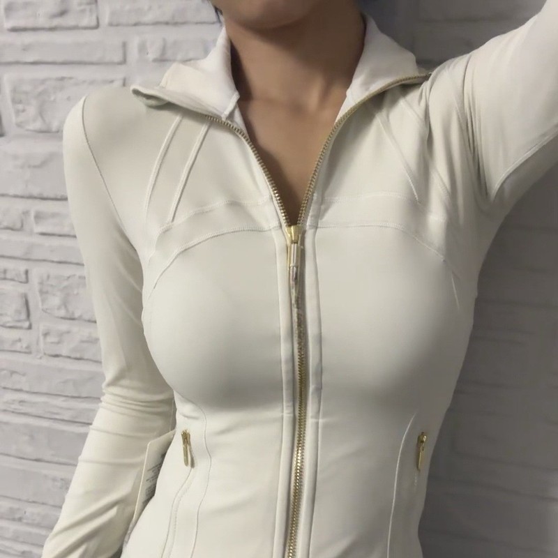 スポーツの女性の金のジッパーのシリーズのヨガの服の女性のジャケットの通気性のスポーツの上着の長袖のフィットネスの服のコート|undefined
