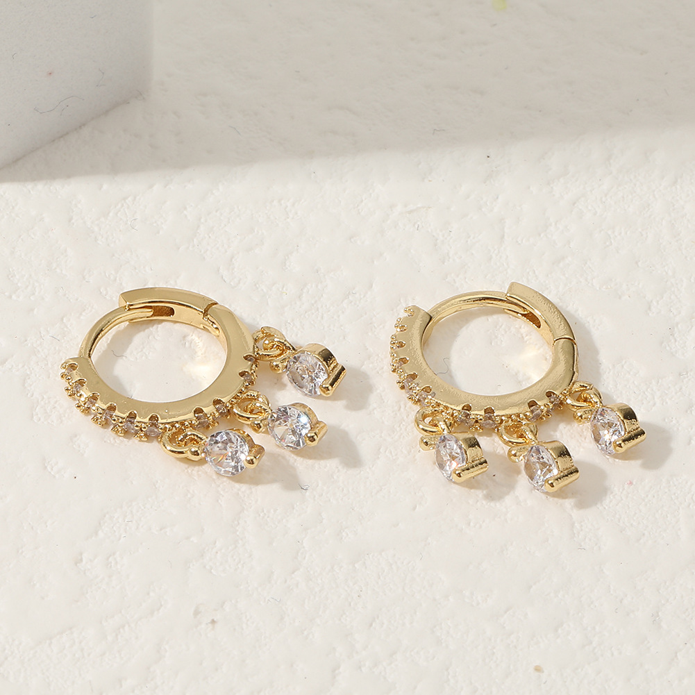 Nuevo estilo europeo y americano de las mujeres de cobre micro-incrustados joyería personalidad creativa pendientes lindos pequeños adornos transfronterizos fuente al por mayor