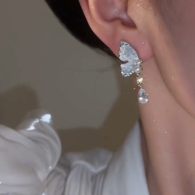 Fashionable elegant earrings drop-shaped
