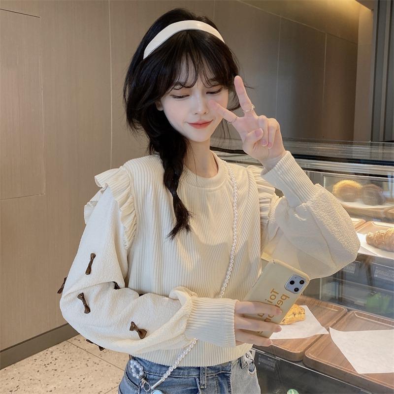 Spring and Autumn New Loose Niche Design Sense Sweet Bow Stitching Fake Two-piece Round Neck Sweater Women's Instagram Fashion
