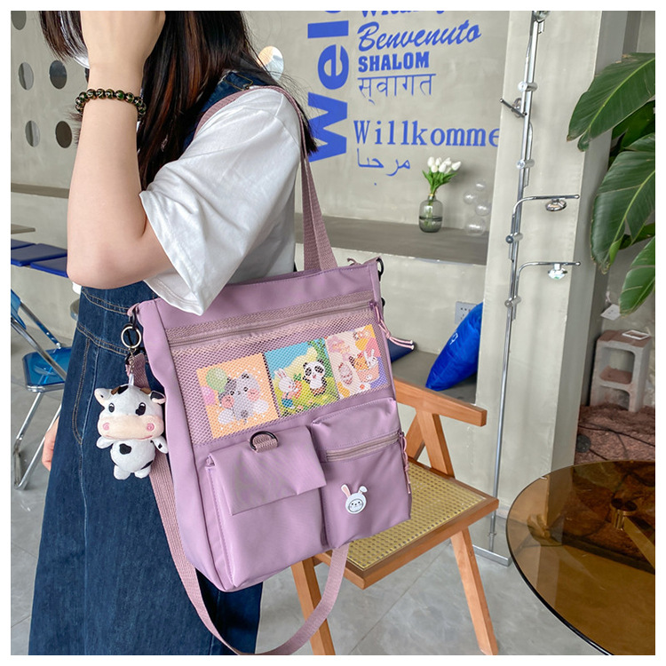 Large-capacity Japanese-style single-shoulder canvas bag for girls, versatile crossbody, ins, a tote bag for junior high school students' classes, and a schoolbag for after-school tutoring undefined