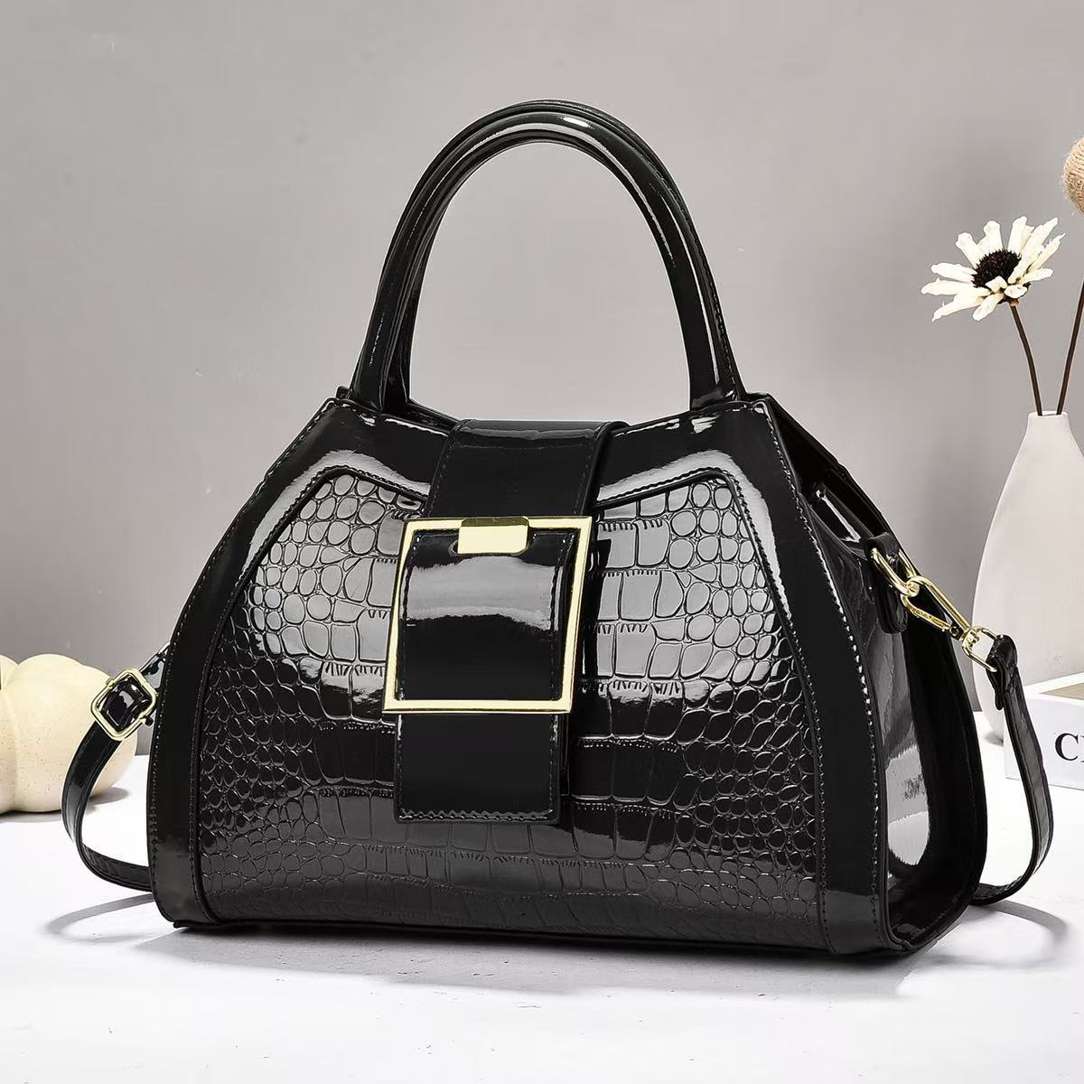 Bolsa de mano de piel brillante de piedra de gran capacidad simple atmósfera mochila de hombro de moda casual bolsas transfronterizas