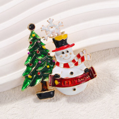 欧米の爆発クリスマスブローチ女性の祝日にクリスマスツリーを飾っています。