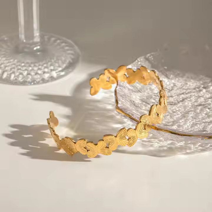 Tina transfronteriza 18k oro mariposa pulsera de acero inoxidable mujer alta sensación de diseño de personalidad versátil pulsera de acero de titanio ins