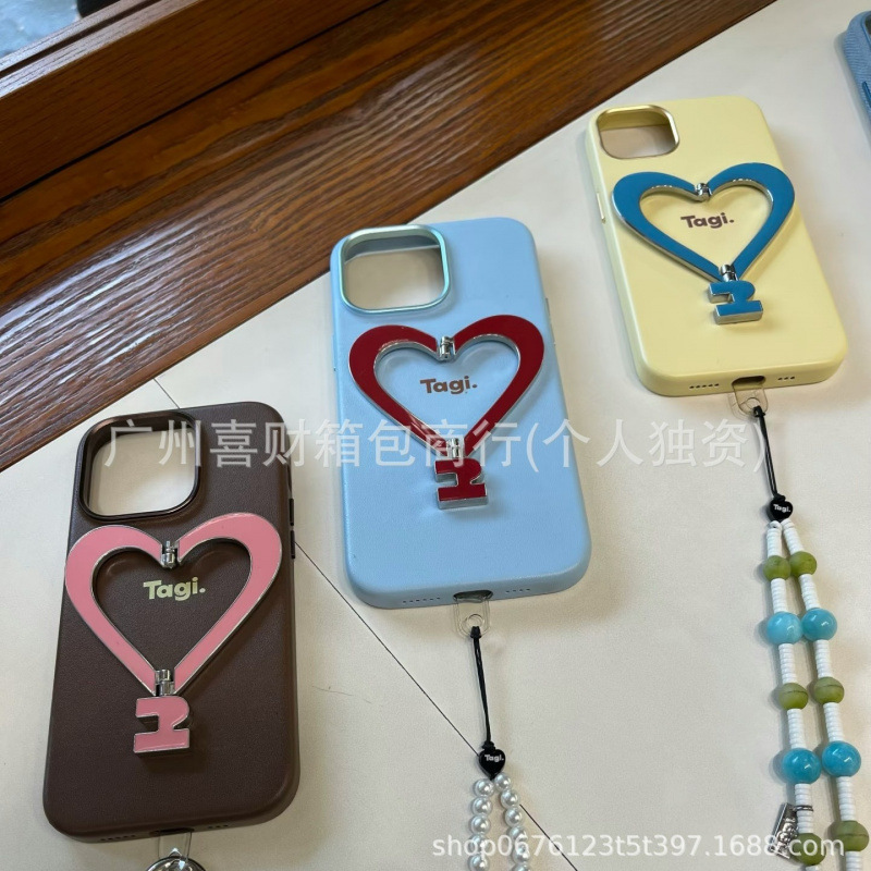 Tagi.《Make People Happy》Metal Stand Leather Heart-Shaped Phone Case for Iphone16Promax Anti-Fingerprint