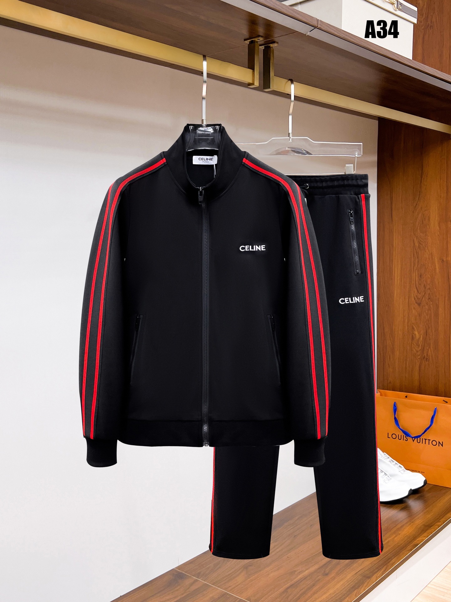 25 años de otoño y invierno de alta calidad nuevo estilo P casa marca de moda cardigan casual suéter deportivo conjunto de parejas