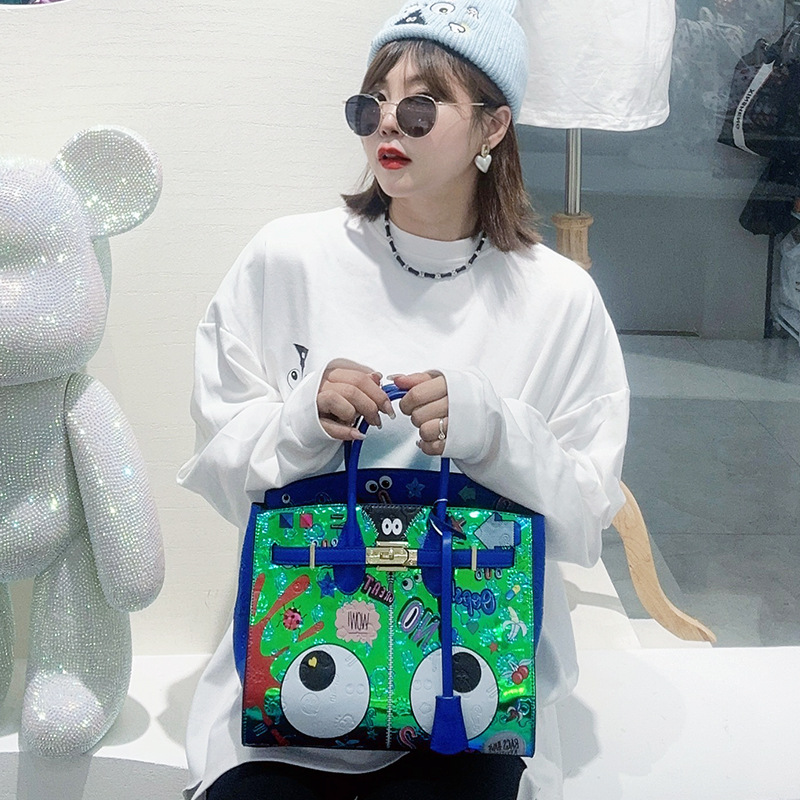 2025 verano fantasía de color metal material especial impresión insignia personalidad bolso de mujer bolso de mano 2486 #