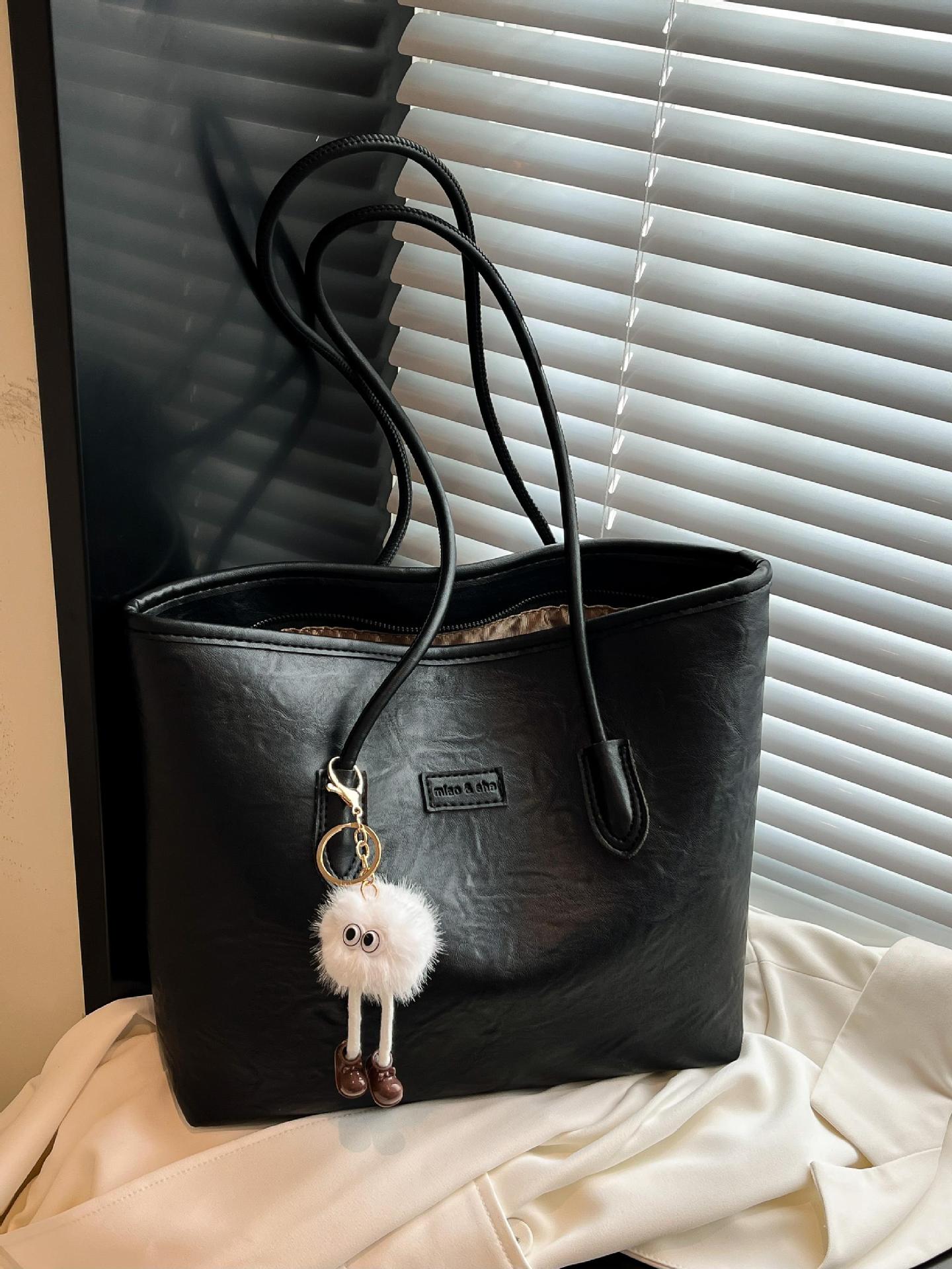 Transfronterizos más vendidos ocio simple bolso de gran capacidad 2025 nuevo producto explosivo bolso de hombro retro bolso de brazo de viaje