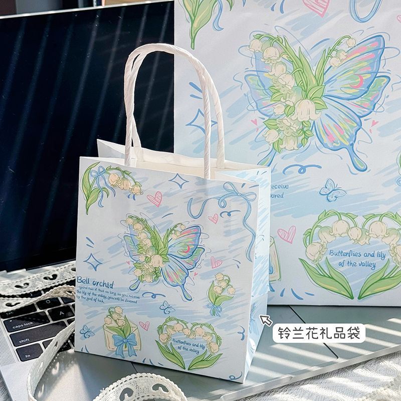 ins轻奢精致铃兰花蝴蝶手提加厚礼品袋高颜值牛皮纸收纳购物纸袋