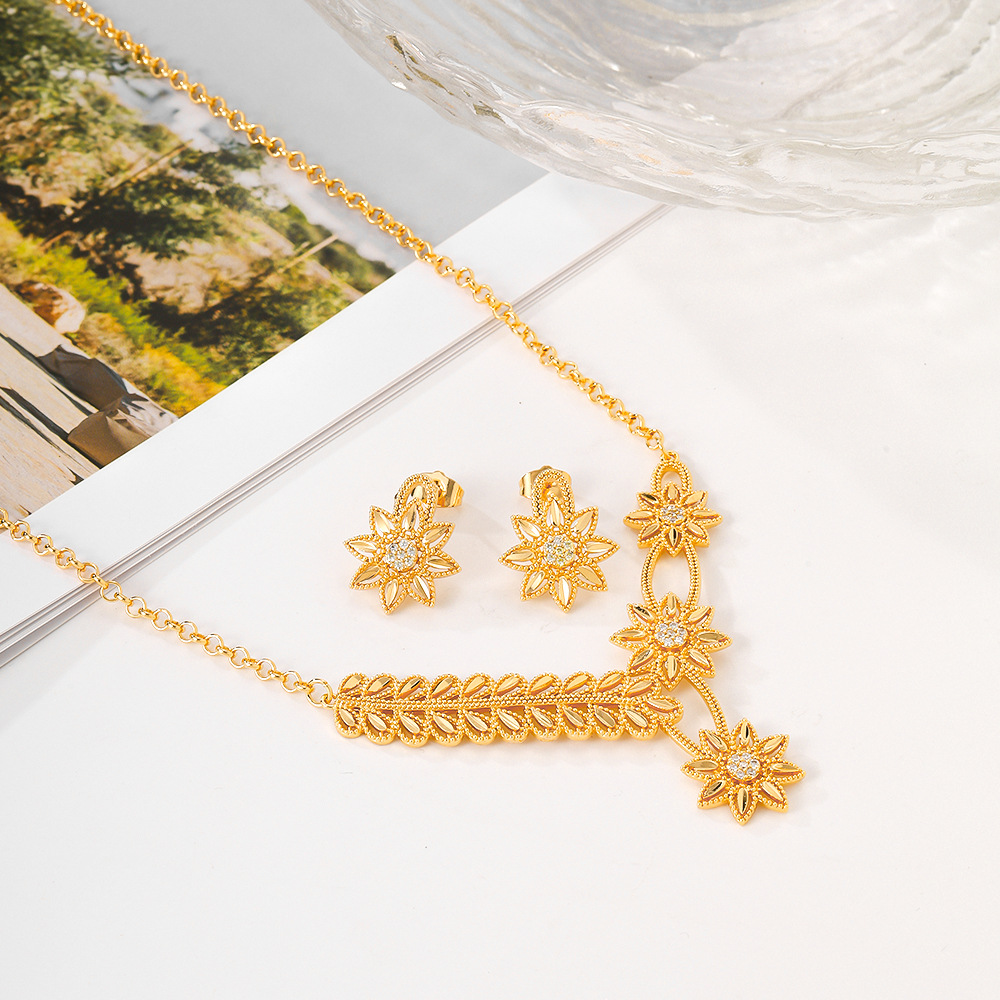 Joyería de moda europea y americana para mujeres aretes de bronce de piedra de aluminio collar de dos piezas juegos de joyería de moda transfronteriza en el Medio Oriente
