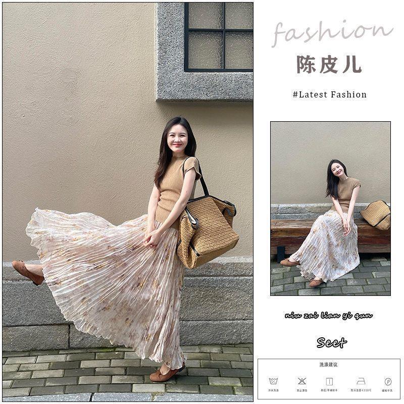 French-Style Elegant Solid Color Knit Sweater Round Neck Short-Sleeved Top for Women Spring and Summer High-Waisted Pleated Floral Skirt Two-Piece Set