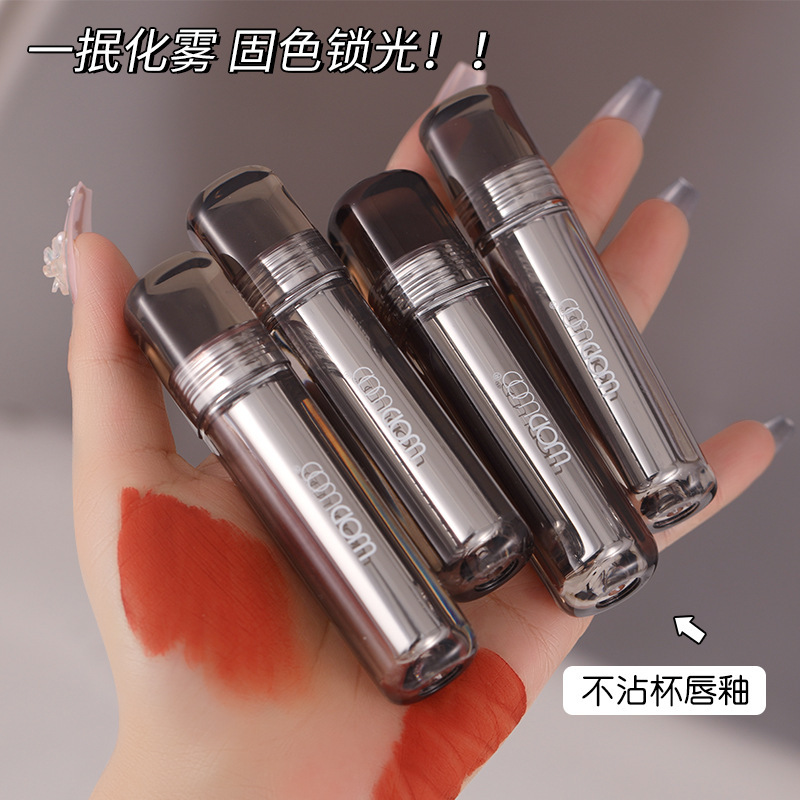 WODWOD シルクミスト メイクアップ ロッキング リップ グレーズは、軽く、保湿力があり、濃厚で美白効果があり、色が長持ちし、カップに付着しにくいリップ グレーズです。|undefined