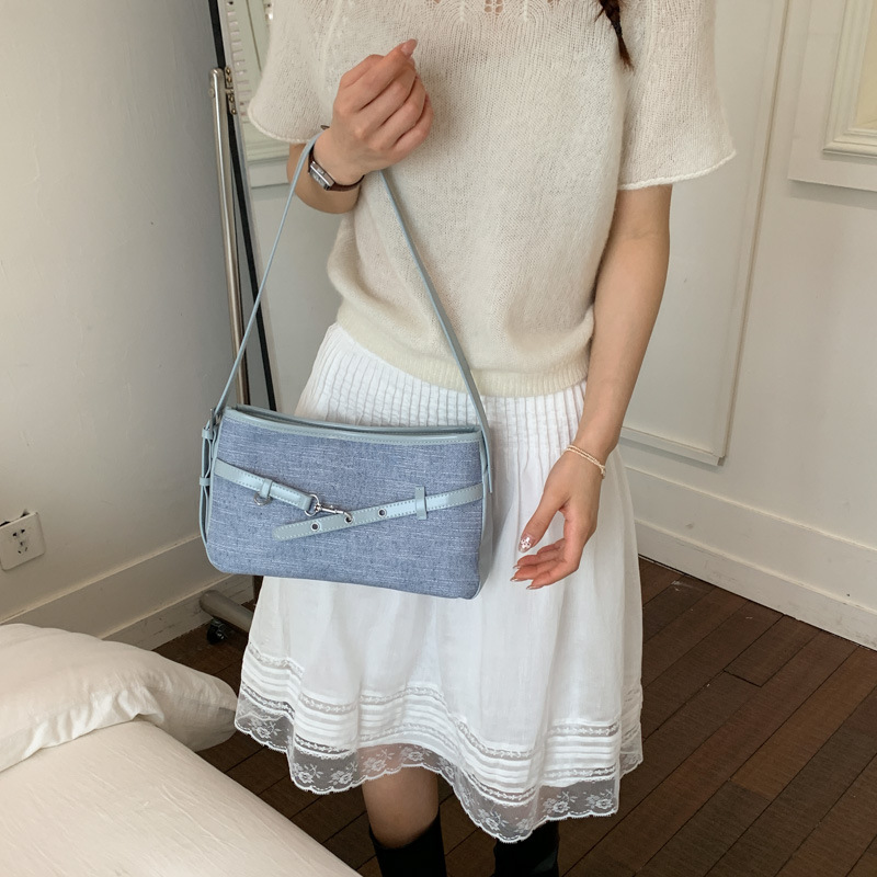 Textura transfronteriza bolso de hebilla de cuero para mujeres 2026 nueva moda diaria bolso de brazo de viaje popular bolso retro