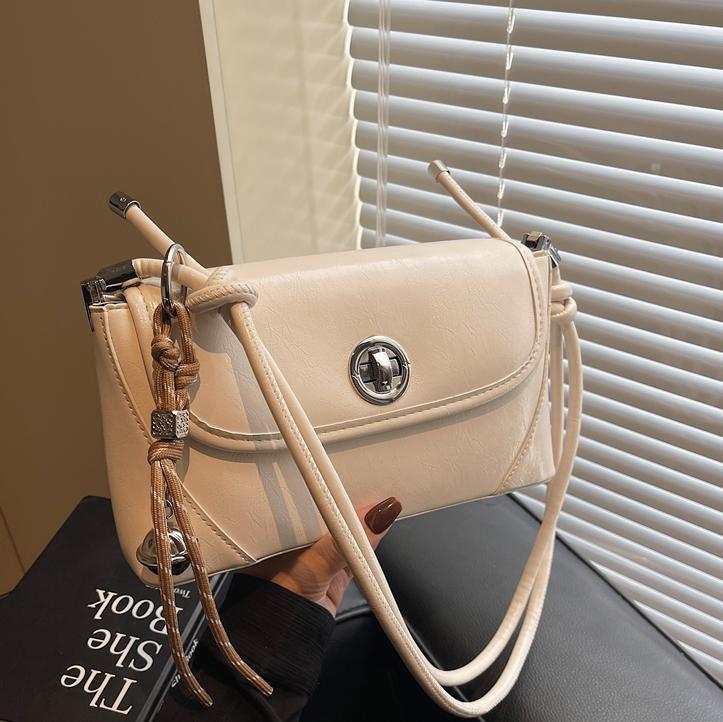 Bolsos debajo de las axilas de piel de cera retrógrada para mujeres 2025, nuevos bolsos de hombro de tendencia universal, bolsos de alta calidad coreanos.