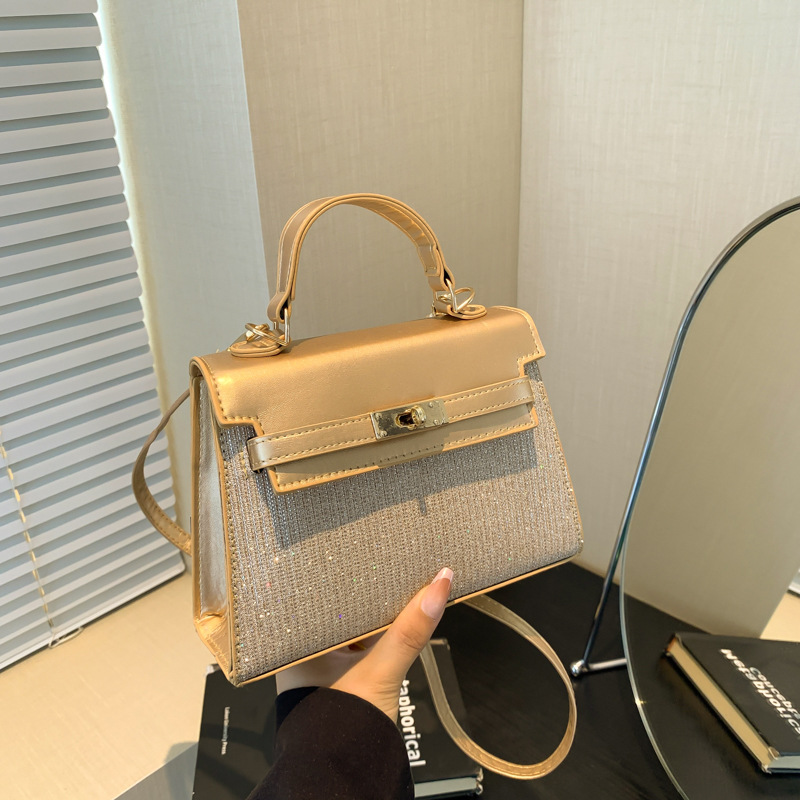 Bolsa pequeña de estilo extranjero para mujeres 2024 nuevo estilo de mano popular coreana de hombro de un solo hombro para viajar sensación de alta calidad bolso Kylie