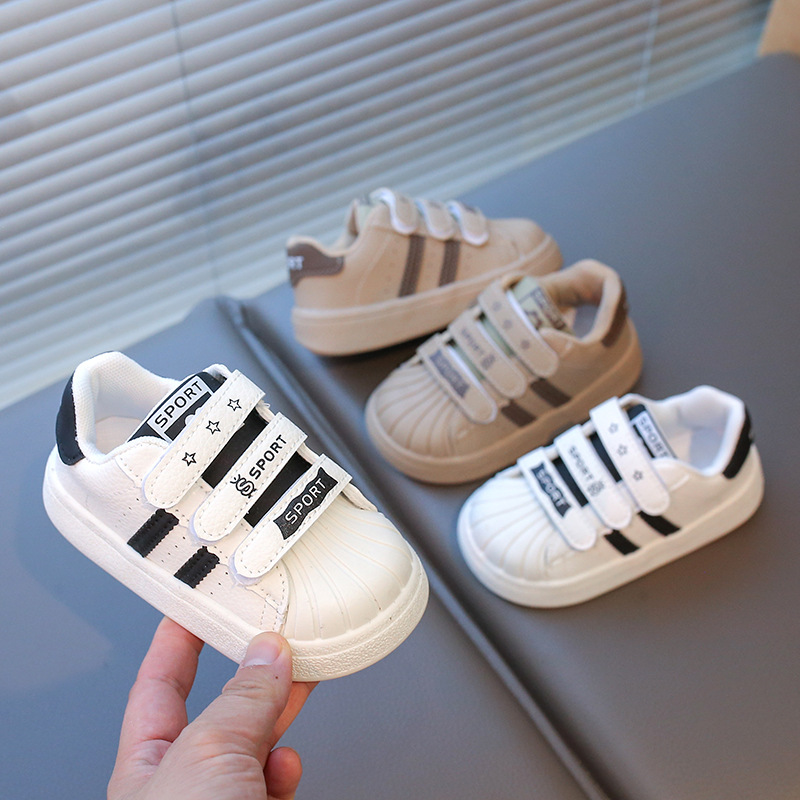 Zapatos de skate para niños con suela suave antideslizante zapatos para niños 2025 cabeza de conchas de primavera zapatos blancos zapatos para bebés zapatos para bebés