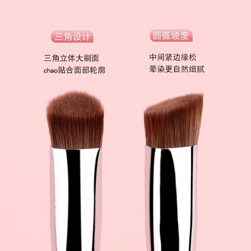 ハイライトブラシ斜め三角アイロンは涙の溝の面の中の法律の紋様を明るくして目の頭をこすります。|undefined