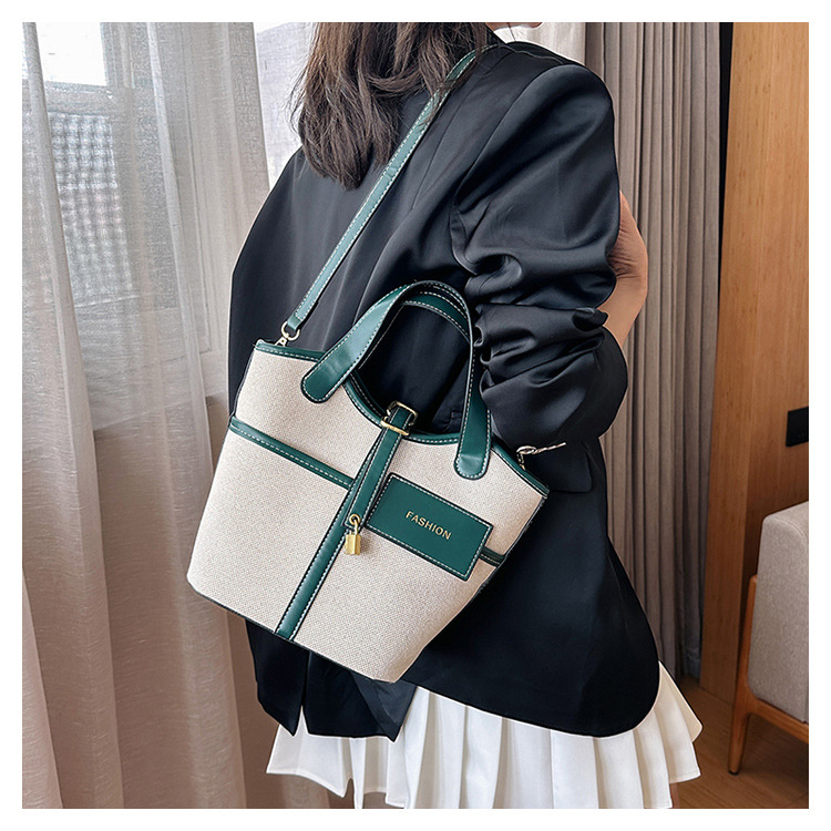 Nicho de diseño retrógrado lienzo portátil bolso de cubo de agua mujer 2026 nuevo cross-border ins canasta de moda bolso de mochila image 11