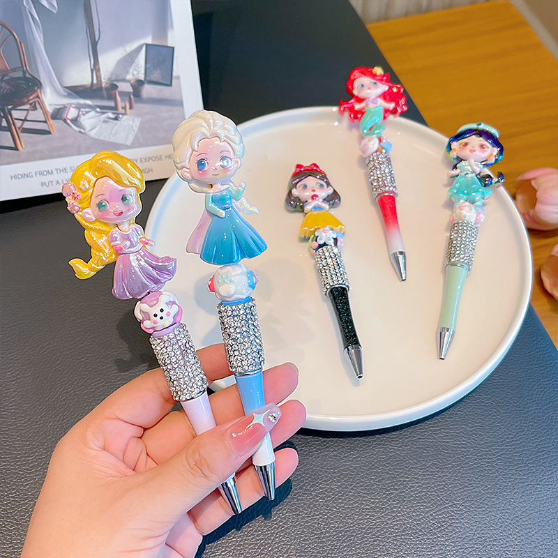 Bolígrafo negro muñeca dibujos animados DIY bolígrafo creativo diamante Snowflake princesa Elsa papelería infantil de color