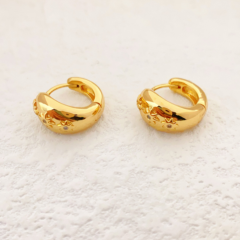 golden small sophisticated earrings