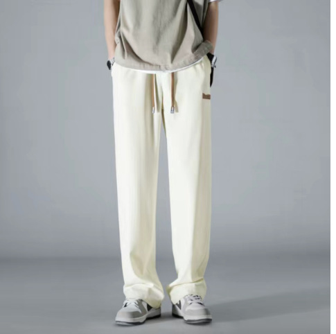 Pantalones de chándal hombres primavera y otoño verano 2023 delgada suelta recta estilo japonés moda drapeado hombres pantalones largos ocasionales