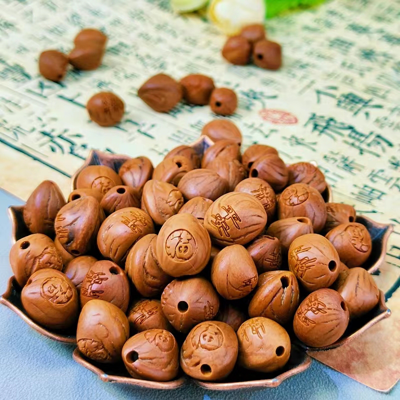 Jewelry pendant material pendant dragon pattern mountain peach core carving cartoon water drop fu character middle hole smooth wear bracelet braided rope