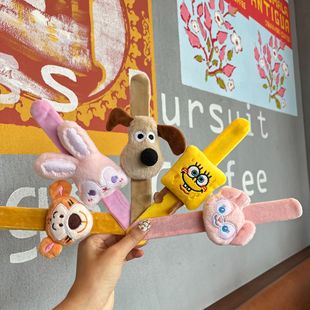 Cartoon children's plush pop ring master dog doll lie prone ring Belle fabric wrist band children's fun decoration wholesale