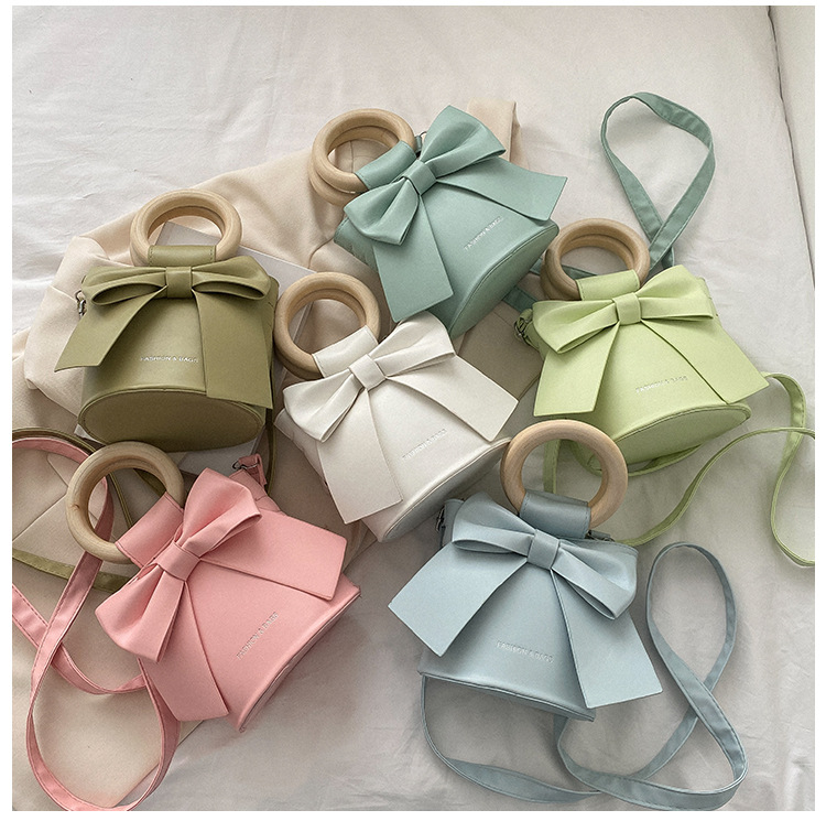 455g Weight Synthetic Leather Lining Material Sewing Thread Fashion Element Magnetic Buckle Closure Type Single Shoulder Strap, Double Handle Strap Type Bucket Bag Bags Type Casual Occasion Pu Leather Material Bow Knot Pattern All Seasons Season Women's Gender Elegant Style Bucket Shape Small Size Women's Small Pu Leather Bow Knot Elegant Sewing Thread Bucket Magnetic Buckle Bucket Bag 41