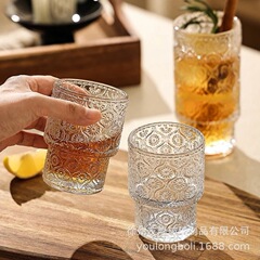 レトロなレリーフ太陽の花の積み重ねのグラスのコーヒーカップの高い顔の値の家庭用のコップのジュースの杯のウイスキーの杯