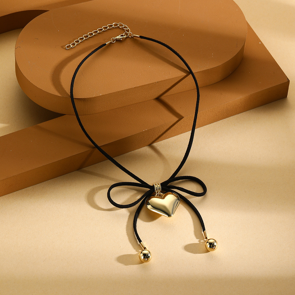 Collana con ciondolo a forma di cuore con fiocco nero, dolce e fresco, esagerata, con laccetto da collo, catena per clavicola._voghion.com