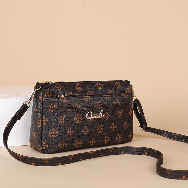 Guangzhou Hengli 2024 nuevo bolso de mensajero transfronterizo bolso casual de mediana edad bolso de teléfono móvil para mujer bolso de venta caliente bolso de hombro