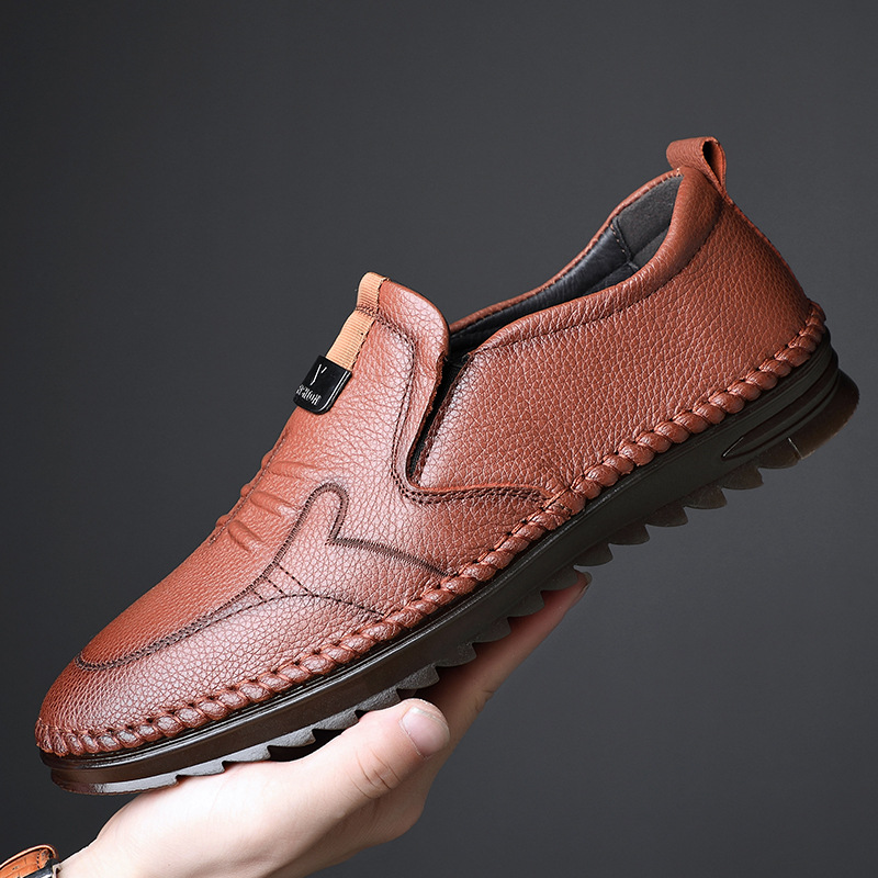 Primavera nueva capa superior de piel de vaca zapatos casuales de los hombres de fondo suave papá zapatos de cuero de los hombres al por mayor hecho a mano solo zapatos de los hombres