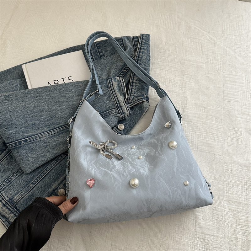 Mochila de diseño de nicho, mochila de hombro, mochila multipropósito, bolsas de cadena de alta capacidad.