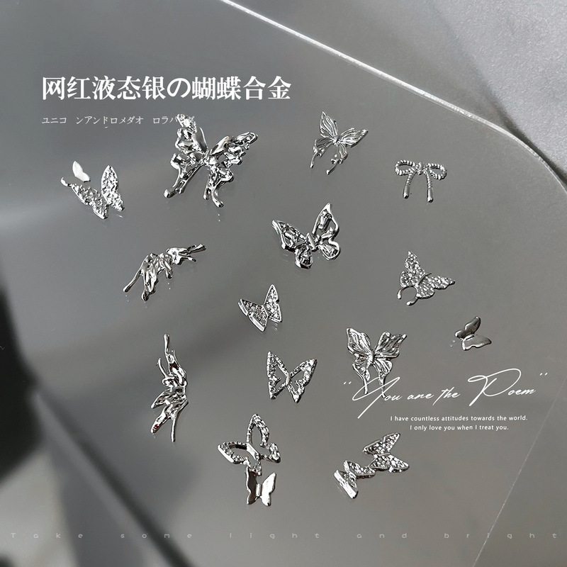 Nail art diamond jewelry wholesale y2g liquid silver alloy butterfly wings hollow mini bow tie nail accessories