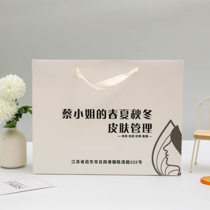 订手提纸袋制企业广告购物白卡纸礼品袋制定外卖牛皮纸袋加印logo