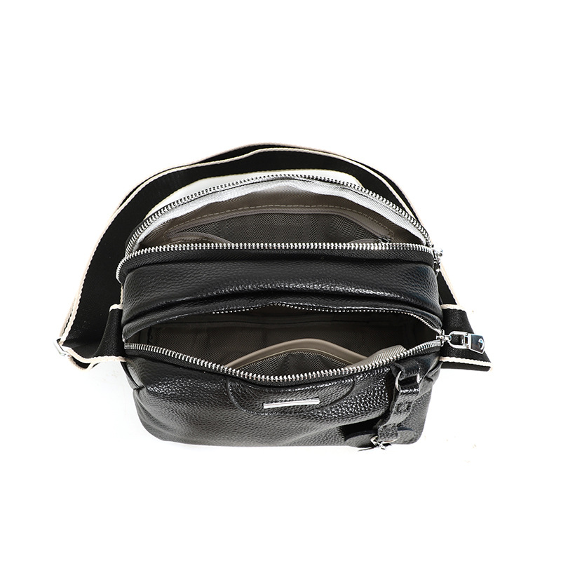 Bolso de cuero real 2025, nueva moda, bolso de hombro de una sola mujer, correa de hombro ancha de cuero, bolso casual de gran capacidad.