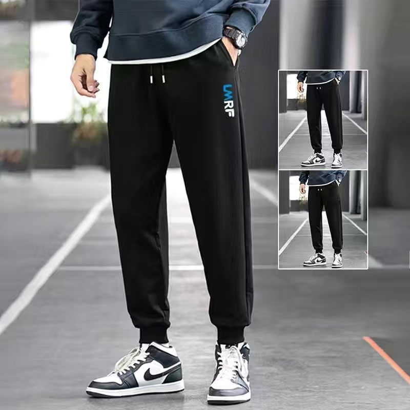 Pantalones de chándal forrados de lana de primavera y otoño para hombres de color sólido rectos delgados estilo coreano popular ins populares Pantalones deportivos casuales comercio exterior