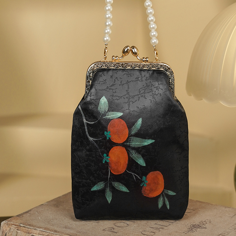 Bolsa feminina vintage artesanal com fecho dourado Chongsam para o Dia das Mães, modelo transversal, estilo festa, da marca Chins Republic._voghion.com