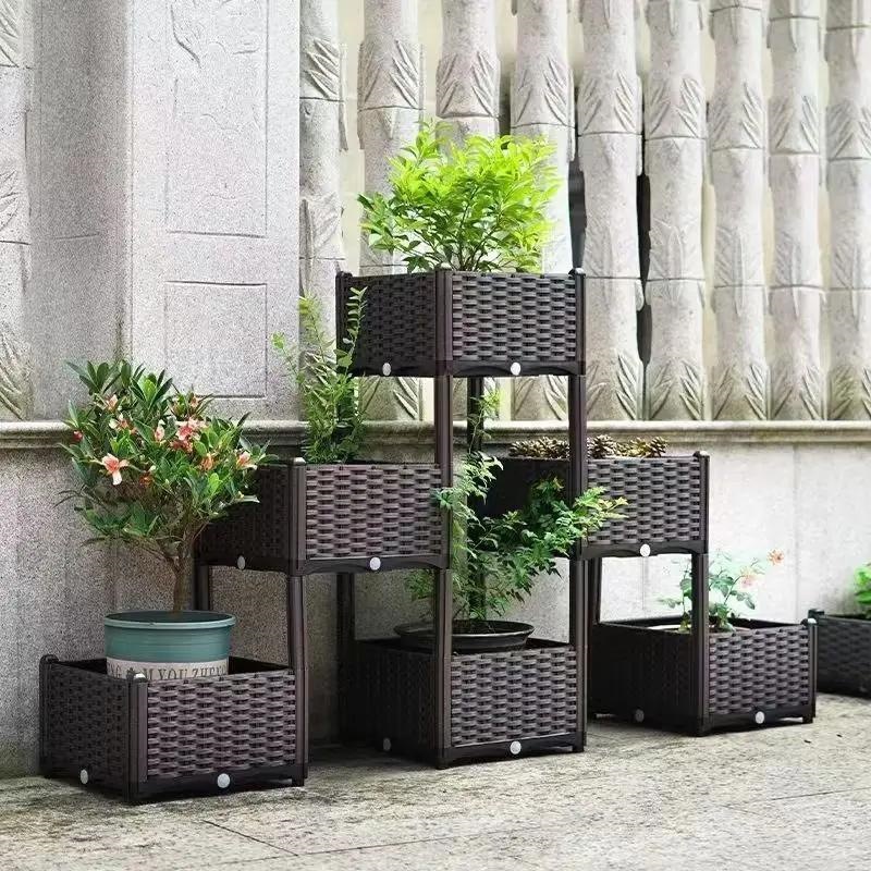 Pyramid-shaped corner planter box for growing vegetables, flowers, and trees on a balcony; a combination of raised and durable planters with a creative design
