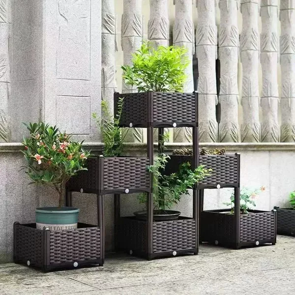 Pyramid-shaped corner planter box for growing vegetables, flowers, and trees on a balcony; a combination of raised and durable planters with a creative design