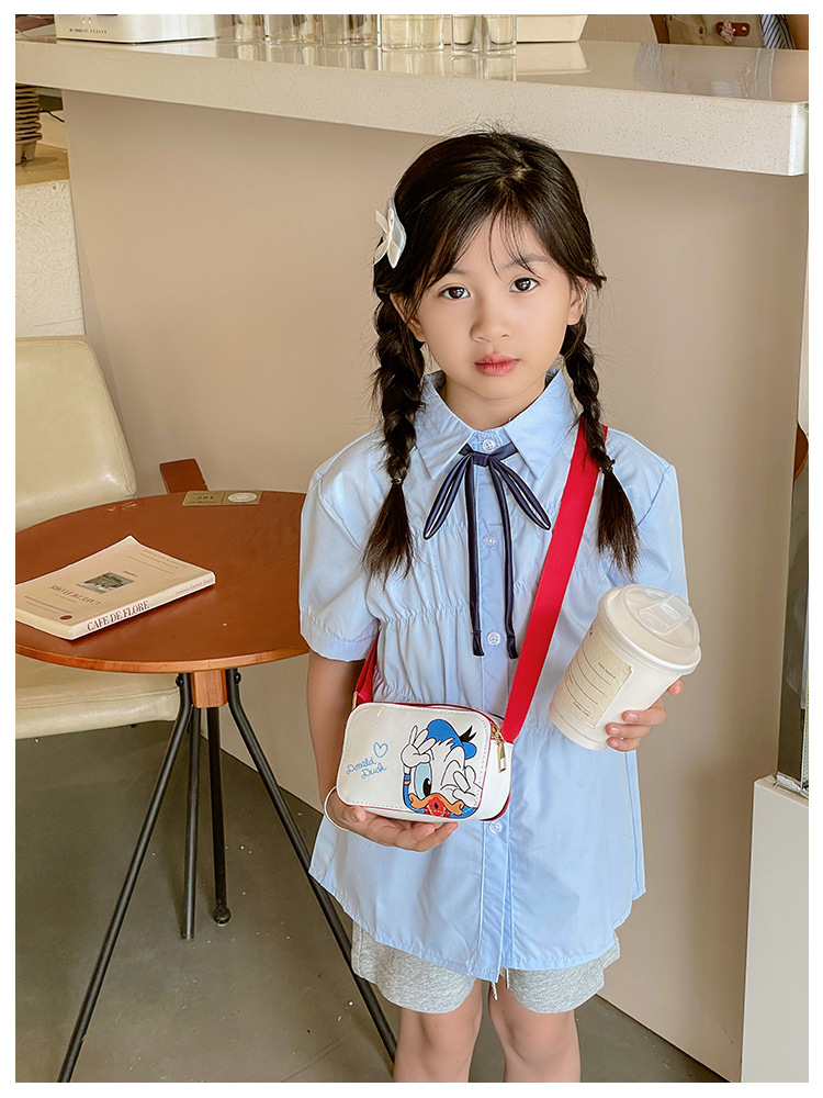 The 2025 new children's mobile phone bag is a trendy, fashionable, fresh, sweet, cartoonish, creative and simple single-shoulder crossbody bag for women undefined