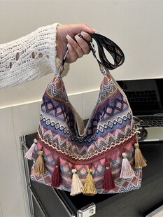 Large-capacity fashionable ethnic style tassel casual bag 2026 new versatile canvas shoulder crossbody bag tote bag