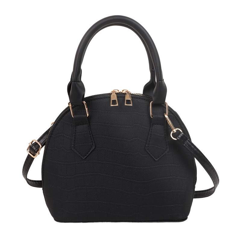 Bolso de mano de piedra para mujeres 2024 nuevo bolso de concha de textura bolso de hombro de moda minimalista estilo elegante mochila