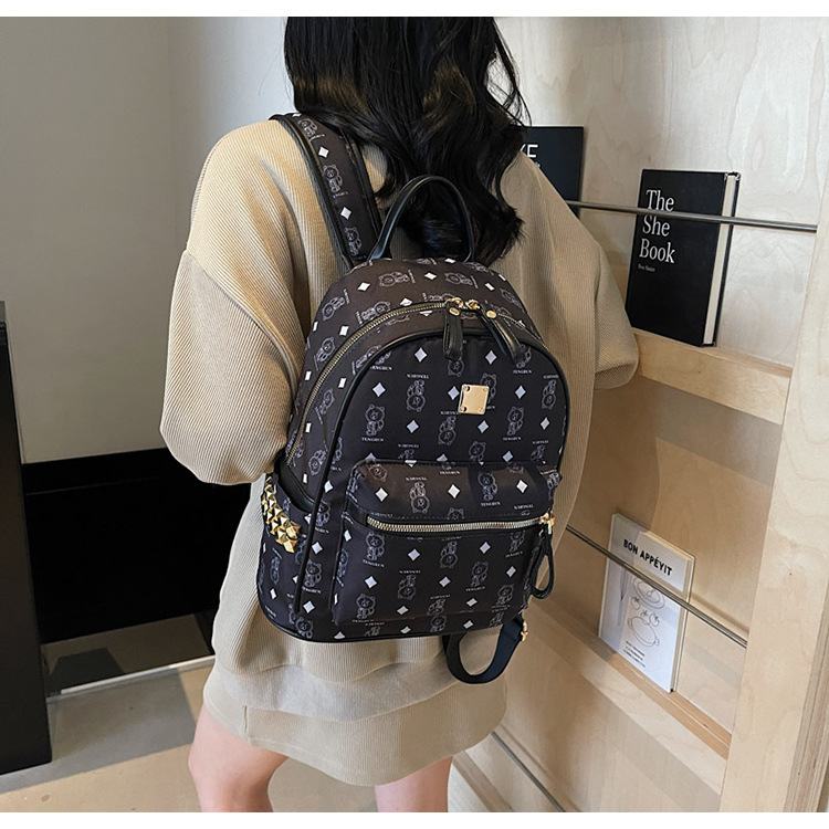 A cute little bear backpack for female college students in 2025, a new fashionable and trendy backpack with a large capacity undefined