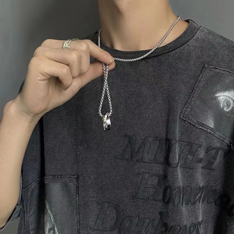 Collane in titanio da uomo di vendita calda, alla moda e personalizzate, doppi anelli ad incastro, olio gocciolante intarsiato_voghion.com