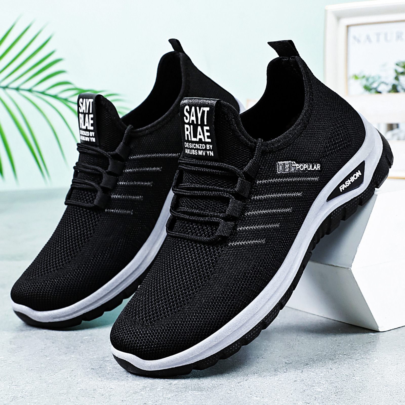 Zapatos deportivos de pareja zapatos de hombre de tamaño grande zapatos de primavera de tela transpirables zapatos casuales con lazos superficiales zapatos de sola suave